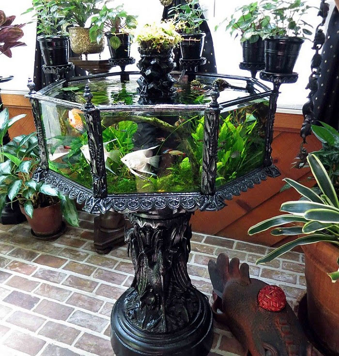 22. An antique cast iron aquarium made in the 1880’s 
