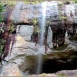 Beli Lena Caves located behind a gently cascading waterfall