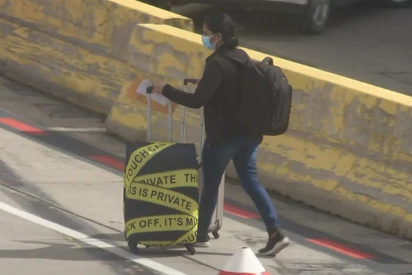 International travellers have flown into Melbourne for the first time in months