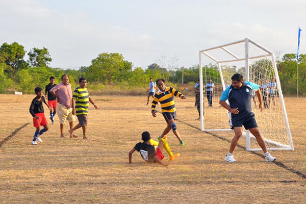 Another goal! Jawa, our 1979/80 Royal Rugby team hooker huffing and puffing and Prabath trying to save the goal. Goal keeper (myself) out of position!