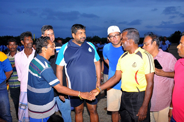 Two teams from islands ready for match. Suku as referee