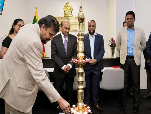 The Consulate General of Sri Lanka in Sydney has been renovated and refurbished on the initiatives taken by Mr. Lakshman Hulugalle, Consul General of Sri Lanka in Sydney. The management of the building agreed to undertake the facelift to the Reception area; Board room and the Office room of the Consul General on complementary without any financial burden on the Sri Lankan government. The Consul General also re-negotiated the rental reduction to the office premises of the Sri Lankan Consulate in Sydney and renewed the Agreement for 5 years resulting a huge amount of savings to the Sri Lankan Government. To mark the occasion, the Consul General organized an event with soft opening of Sri Lanka Mission in Sydney on Thursday, 11th March 2021 inviting officers of the building management, representatives of the Sri Lankan Associations and the selected Sri Lankan dignitaries in Sydney. In line with the Sri Lankan customary guests were invited to light the traditional oil lamp and to Sri Lankan traditional delicacies which were organized by the staff of the Consulate General of Sri Lanka in Sydney. In his short remarks, the Consul General stated that the renovation and refurbishment of Sri Lanka Mission in Sydney has been done after laps of 15 years. “With facelift to the Mission, the Sri Lankan community in New South Wales and Queensland will receive a better service from the Consulate Office”, Consul General said. He also thanked the management of the building for accepting his requests and prompt response in undertaking the renovation and refurbishment on a complimentary basis. The invited guests expressed their pleasure to the changes in the Mission and appreciated the initiatives taken by the Sri Lankan Consul General in Sydney. Consulate General of Sri Lanka in Sydney 12th March 2021