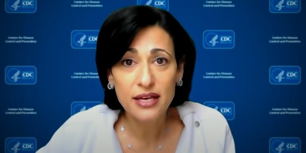CDC director says data 'suggests that vaccinated people do not carry the virus' by Azmi Haroun and Hilary Brueck 