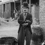 Charlie Chaplin finds a baby - The Kid (1921)