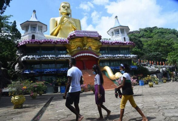 Tourists trickle in Golden Temple of Dambulla 3