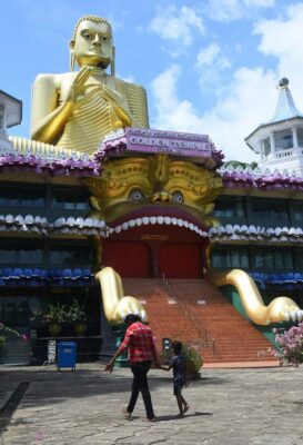 Tourists trickle in Golden Temple of Dambulla 3