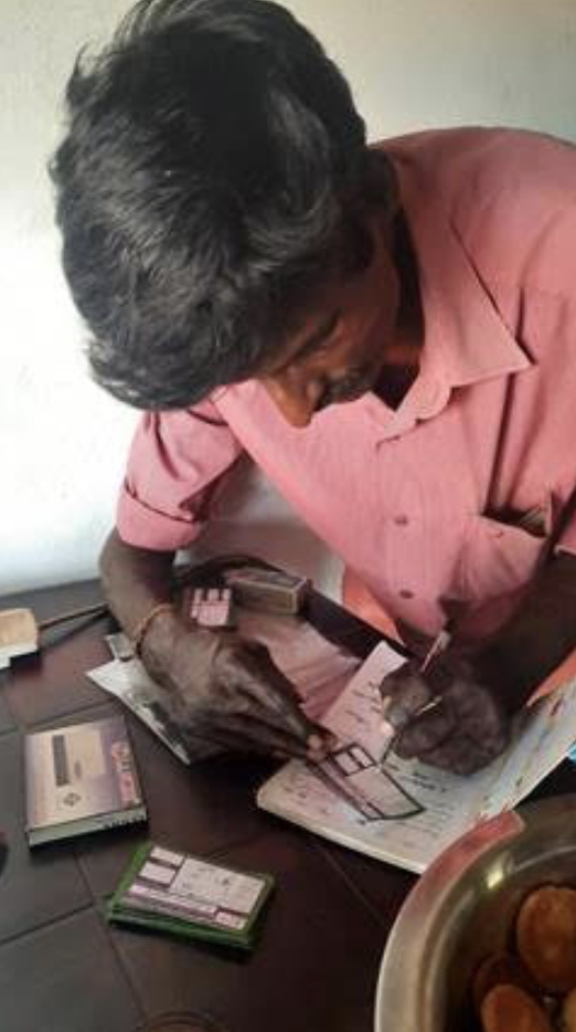 Yasotha runs a biscuit shop in a small village in Manthai East, Sri Lanka. by GOWSHAN NANDAKUMAR