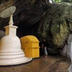 Rock-hewn Buddha Statue of Dowa Cave Temple By Arundathie Abeysinghe