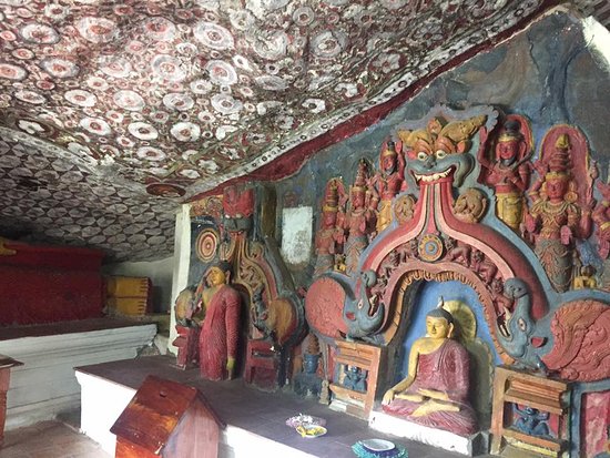 Rock-hewn Buddha Statue of Dowa Cave Temple By Arundathie Abeysinghe