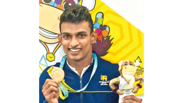 Dilanka Kumara with his bronze medal