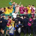 Graham Arnold and his team