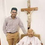 The writer with Archbishop Emeritus Oswald Gomis