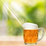 glass full of beer.