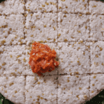 Once cooled, cut the milk rice into desired pieces and serve as a delightful  delicacy.
