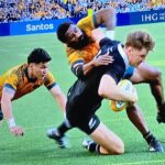 All Blacks hang on to Bledisloe Cup for another year after a riveting encounter against the Wallabies.  - BY TREVINE RODRIGO IN MELBOURNE. (eLanka Sports Editor).