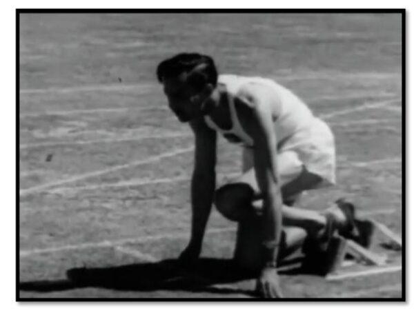 Duncan White at the start of the 440 Hurdles Finals.