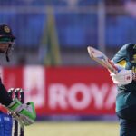 Defending champions Australia cruise to opening win over Sri Lanka